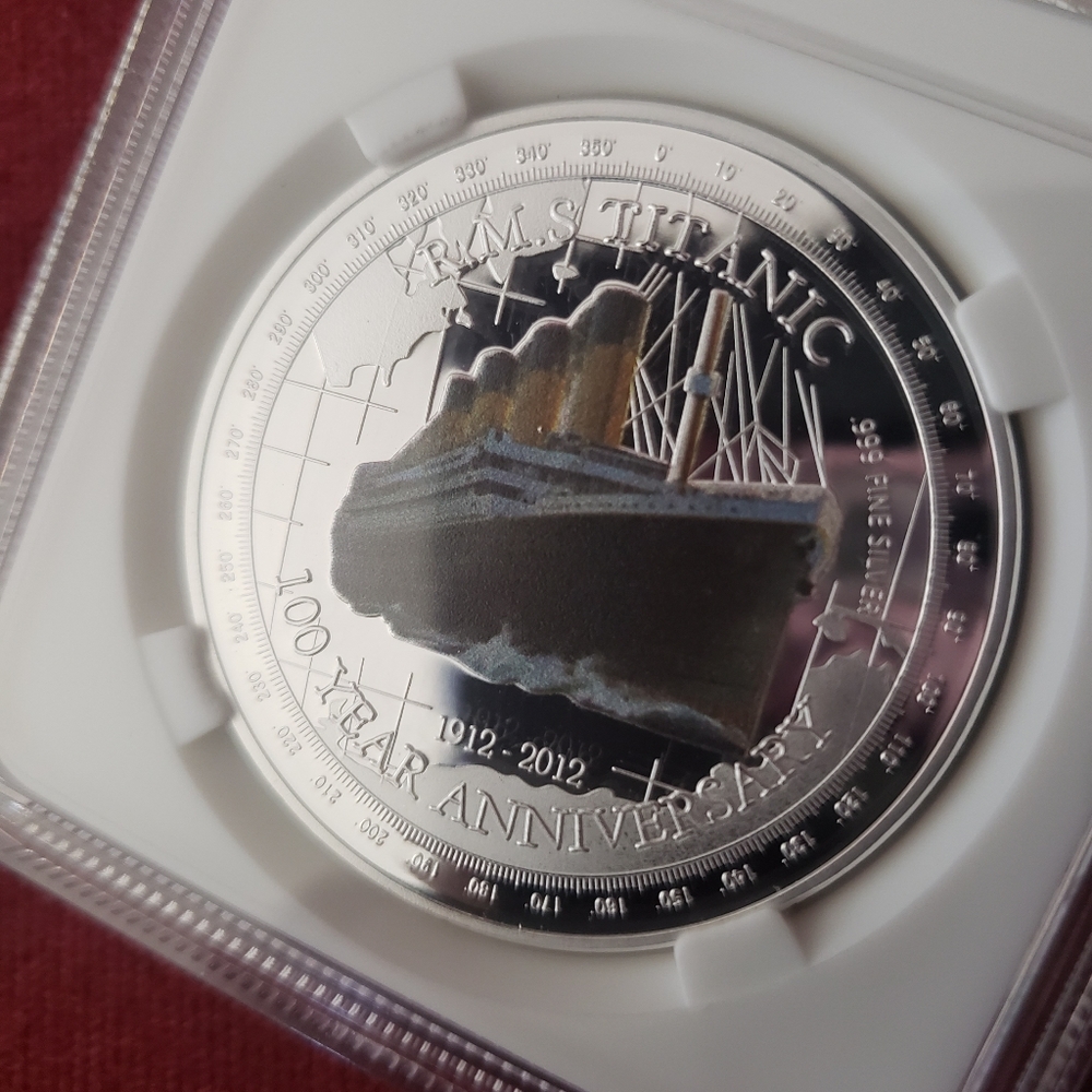 Authenticity certified Titanic/ Queen Elizabeth Commemorate Coin and certificate